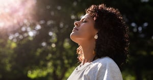 Woman outside breathing fresh summer air